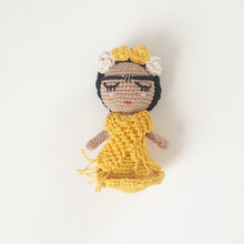 yellow small doll