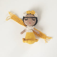 yellow small doll